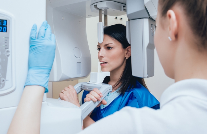 Dental patient receiving digital x ray scans