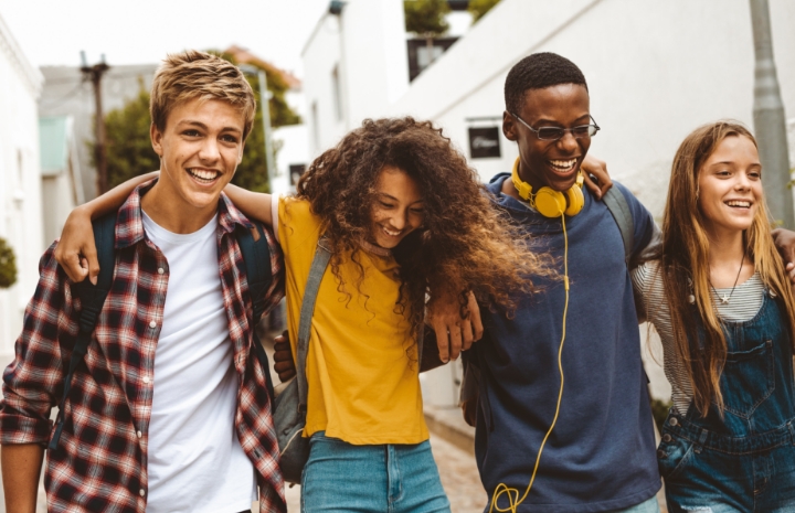 Smiling teens after preventive dental care visit