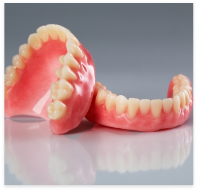 Full set of upper and lower dentures