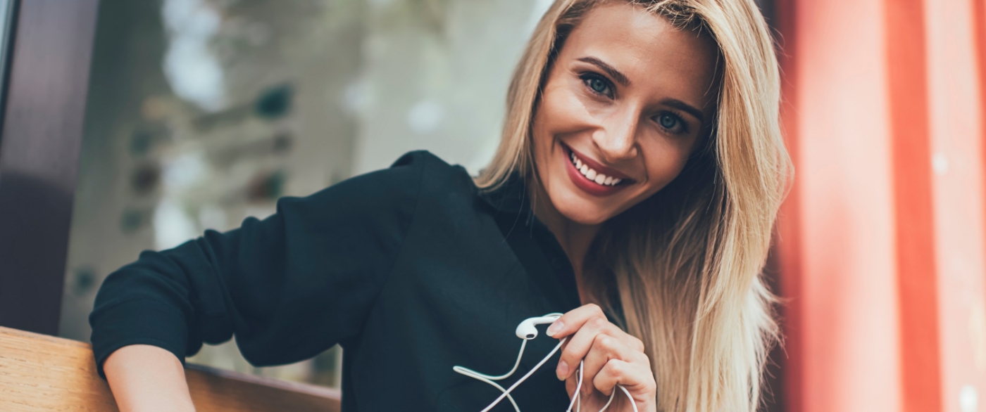 Woman sharing flawless smile after cosmetic dentistry