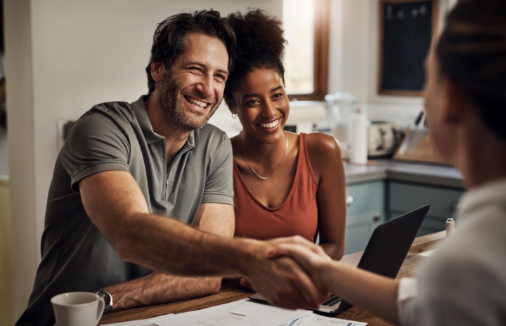 Dental patients discussing the cost of cosmetic dentistry