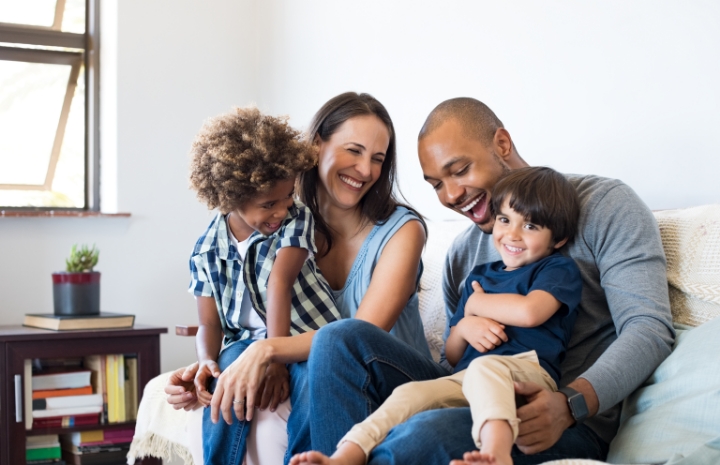 Smiling family of four