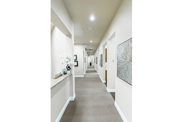 Hallway leading to dental treatment rooms