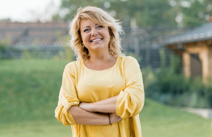 Woman smiling after oral cancer screening