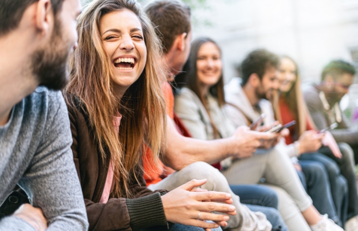 Friends laughing together after root canal treatment