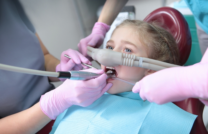 Young dental patient receiving nitrous oxide sedation dentistry