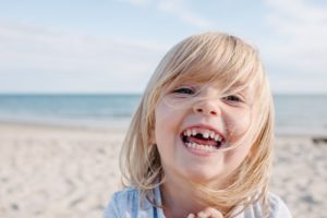 child with missing tooth