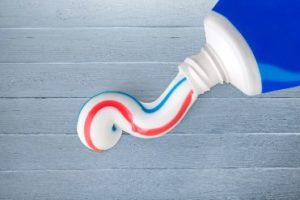 Toothpaste being squeezed out